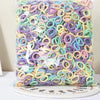 A clear plastic bag filled with colorful nylon elastic hair cords in various pastel shades for kids headbands