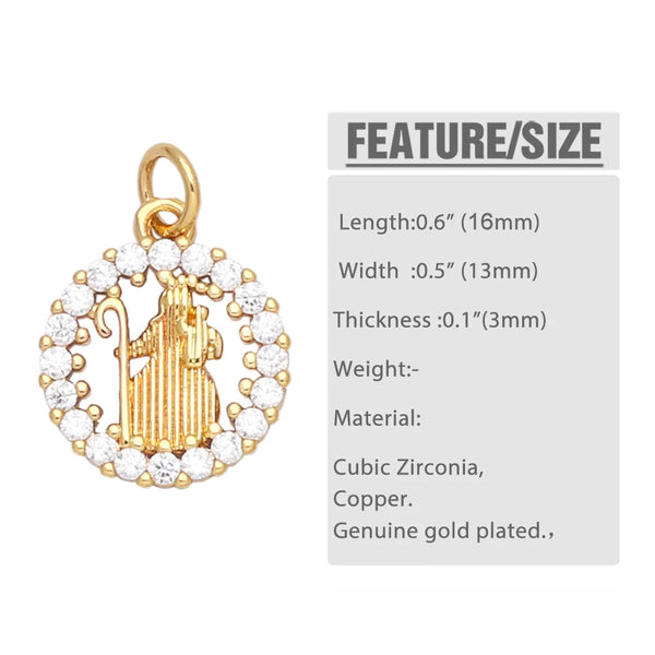 A gold plated charm featuring a Virgin Mary figure and a cross, surrounded by a circular border of clear stones.