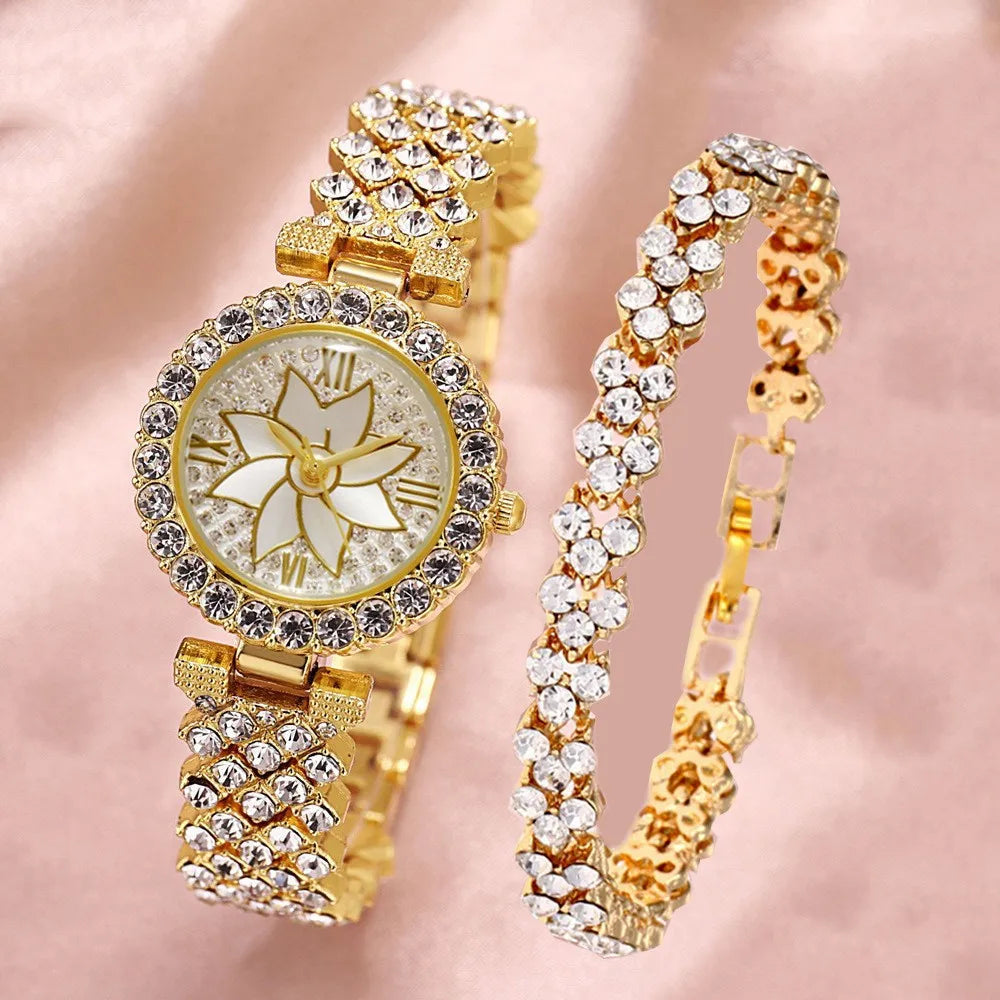 A gold-toned rhinestone quartz watch and bracelet set featuring a circular watch face with Roman numerals and a beaded bracel