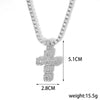 A sparkling rhinestone cross pendant necklace shown against a white background.