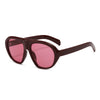 A pair of dark reddish-brown vintage gradient leopard print sunglasses with thick frames.