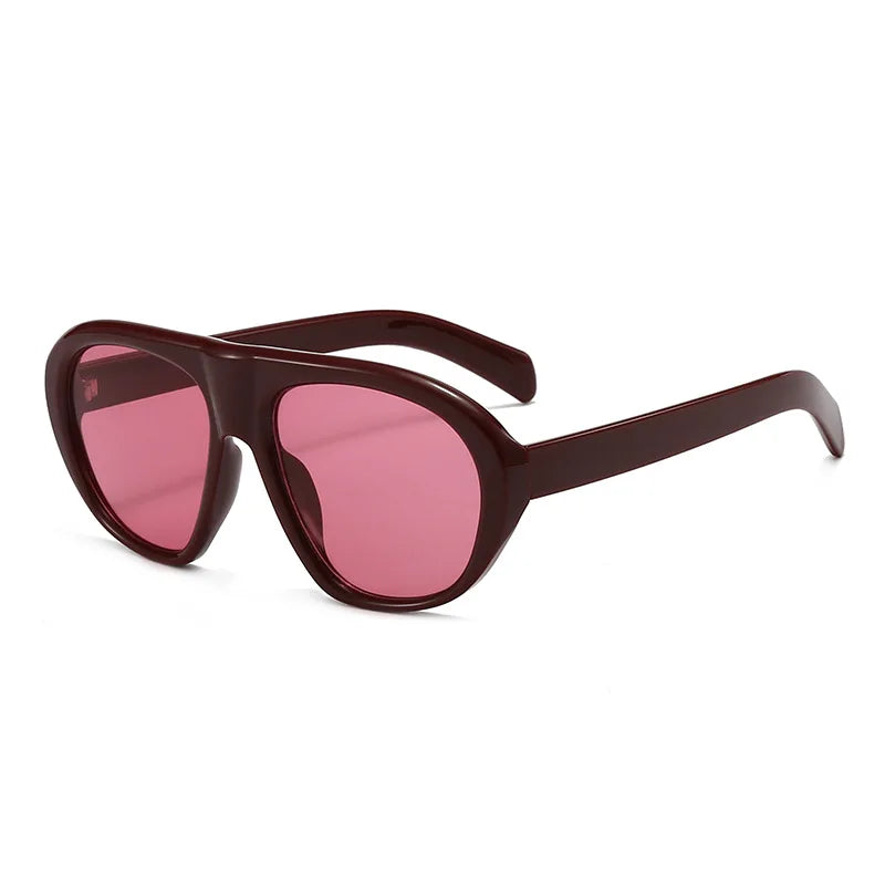 A pair of dark reddish-brown vintage gradient leopard print sunglasses with thick frames.