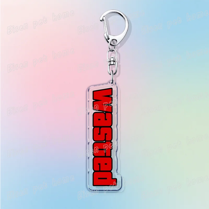 Silver pendant keychain with red text reading WASTED on a clear rectangular tag