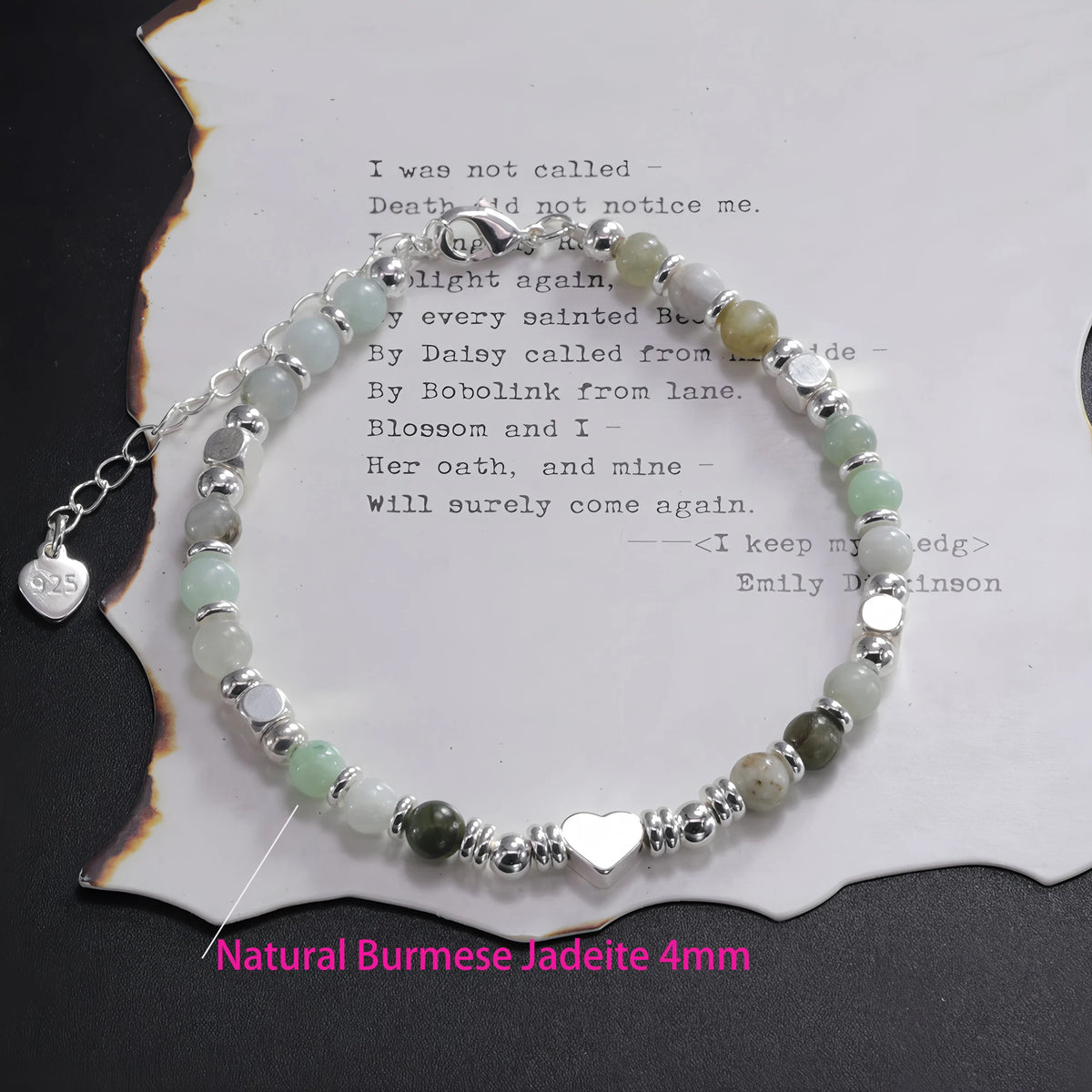 Sterling silver double heart charm bracelet featuring natural Burmese jade stones and silver accents
