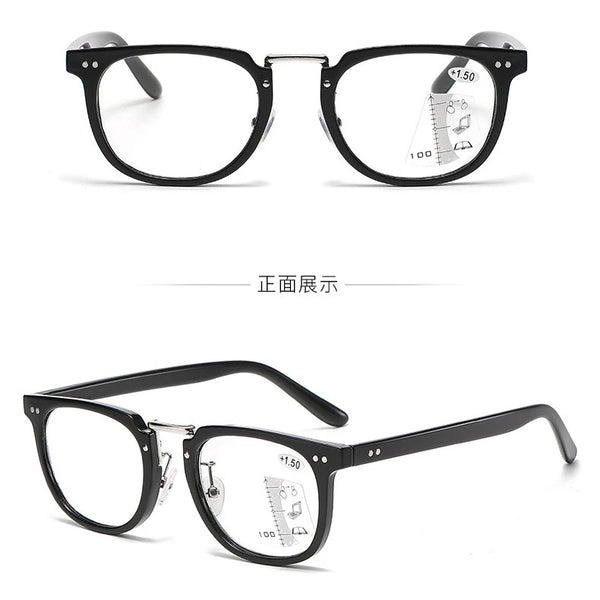 A pair of black multifocal reading glasses shown in a frontal view with a diagram illustrating magnification.
