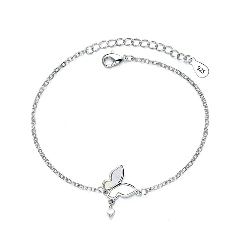 Sterling silver double heart charm bracelet with a chain and a butterfly charm