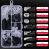 A clear plastic container holding various silicone ear grip hooks for glasses and sunglasses in different shapes and sizes