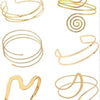 A set of six gold-plated swirl cuff armbands shown individually.