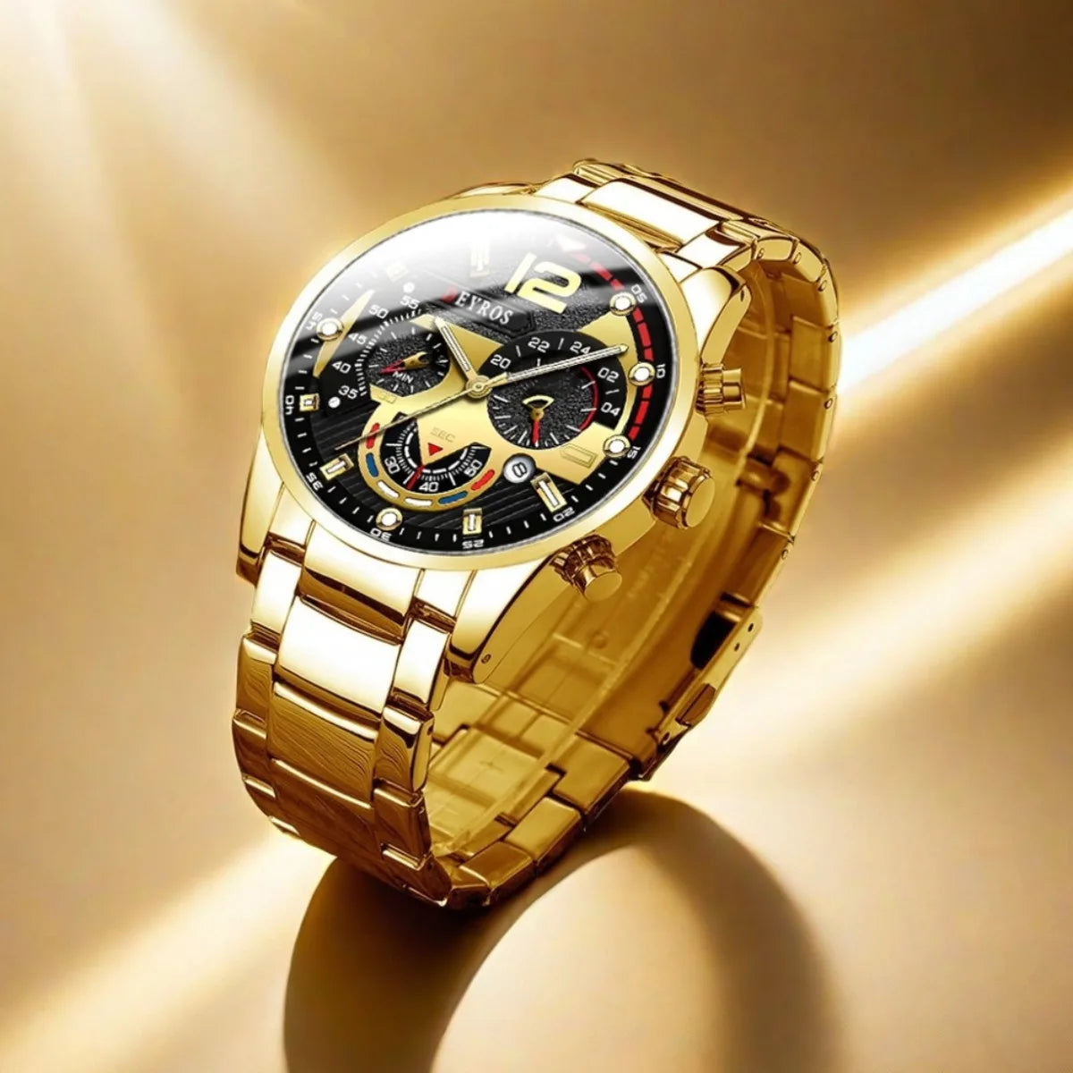 A close-up shot of a gold-toned watch with a black dial and luminous hands, resting on a smooth surface.