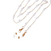 Gold chain with white pearls used as an eyeglass lanyard and chain