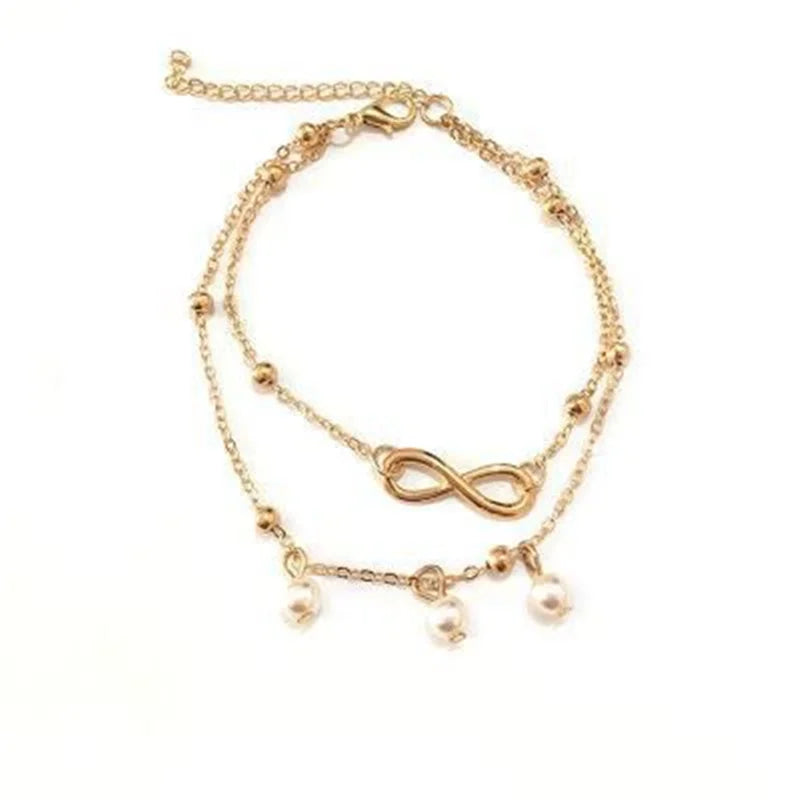 Sandale à cheville en perles dorées avec un charm infini et de petites perles rondes pour femmes