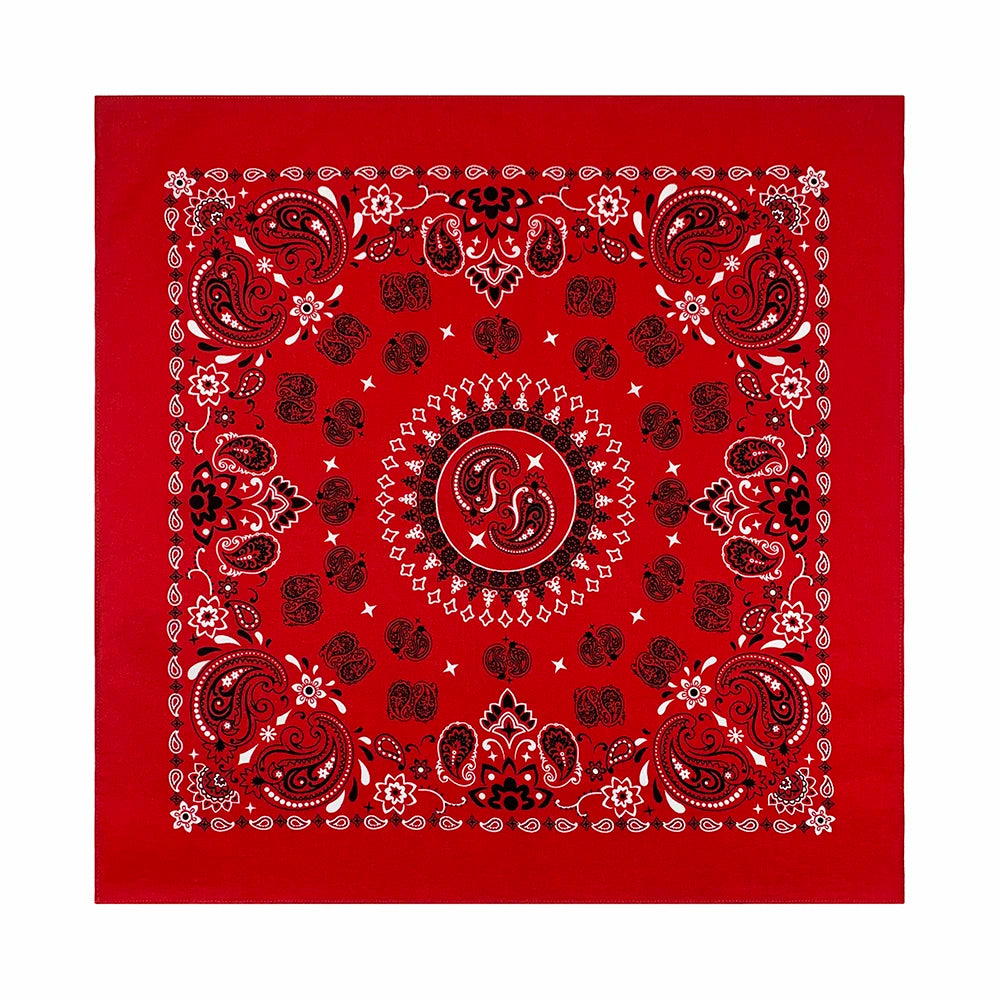 A red square fabric featuring intricate red and white paisley patterns.