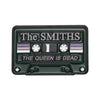 A black enamel pin brooch featuring the text The Smiths and The Queen Is Dead