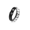 Set de bracelets à manchette en cuir noir avec des clous argentés piquants