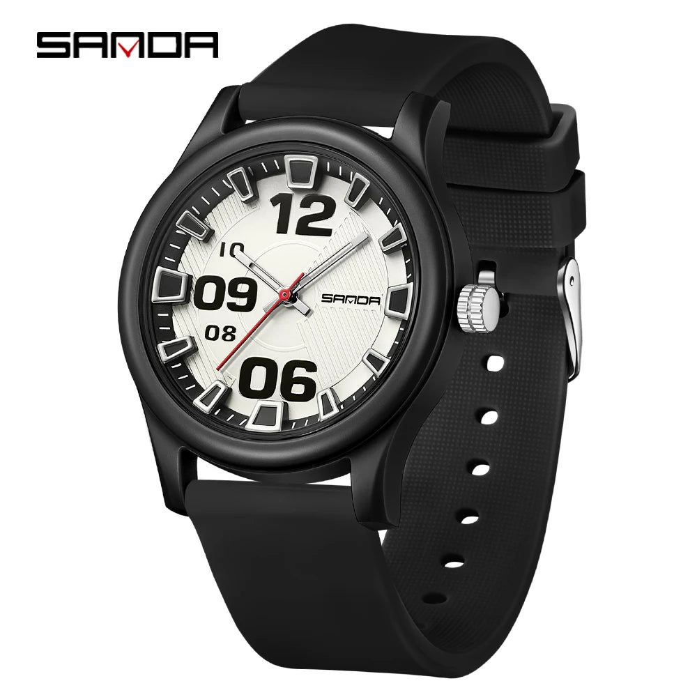 A black classic quartz fashion watch with a white face and silver hands on a black silicone strap.
