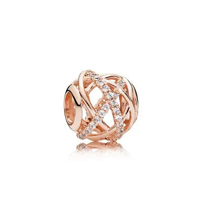Rose gold cherry blossom charm pendant featuring intricate interwoven wire design
