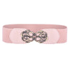 A pink vintage leather elastic belt with a decorative brass twisted buckle.