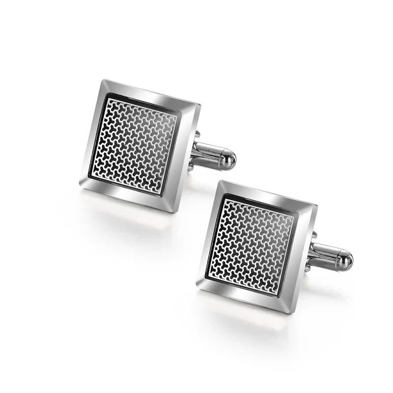 Silver cufflinks with a textured square design and silver findings