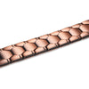 A close-up view of a copper magnetic therapy bracelet with a textured, hexagonal design.