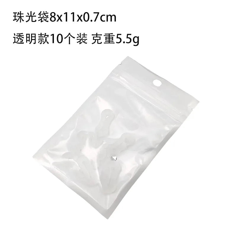 Bolsa de plástico transparente con diez extensiones de manga de camiseta, peso total de 5.5 gramos.