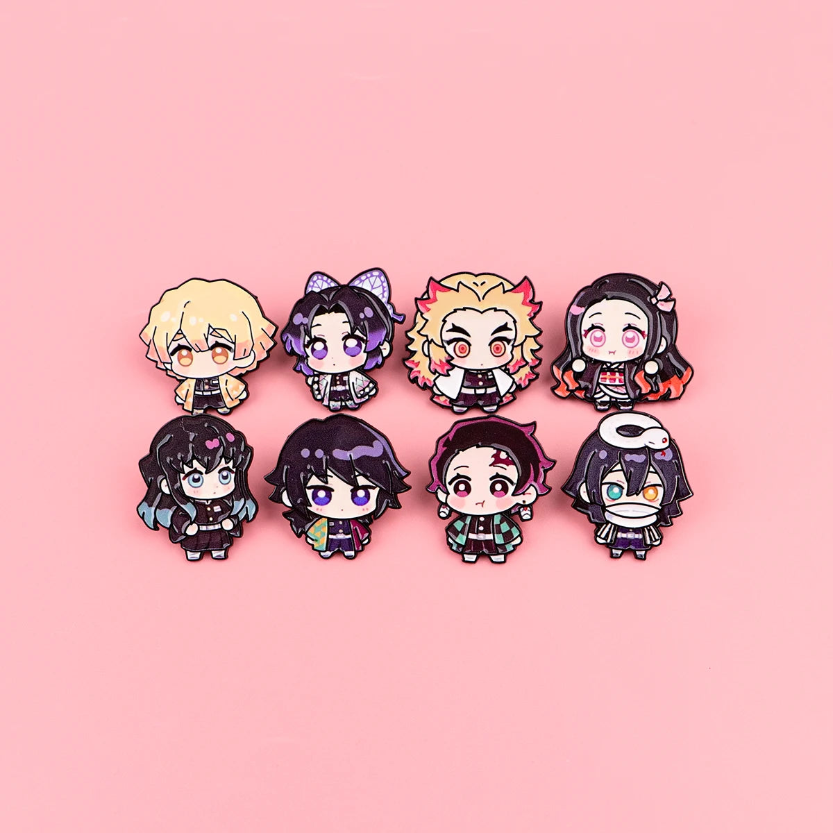 A set of eight cute enamel cartoon brooches featuring various stylized characters and hair colors on a pink background.