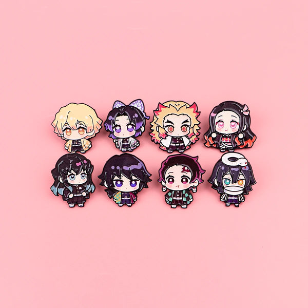 A set of eight cute enamel cartoon brooches featuring various stylized characters and hair colors on a pink background.