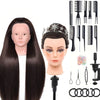 A set of professional cosmetology practice mannequin heads with hair, combs, and styling tools.