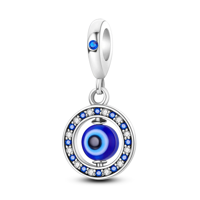 Sterling silver devil's eye charm bracelet featuring a round blue and black gemstone pendant