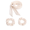 Bandeau de fer à boucler pour cheveux, couleur beige clair, en forme enroulée et ouverte.