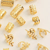 A collection of elegant gold hollow hair rings and braiding accessories.