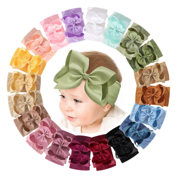A circular arrangement of soft baby headbands with chunky hair bows in various pastel and earth tones.