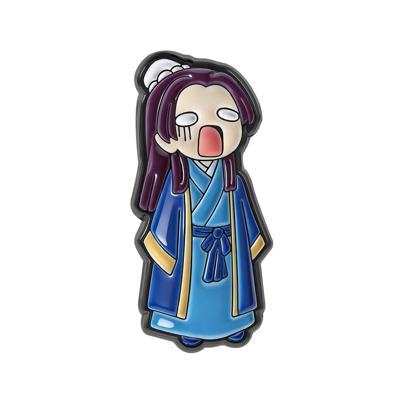 A cute anime character brooch lapel pin depicting a person with dark hair and an open mouth.
