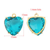 A pair of turquoise heart-shaped crystal pendants with 1.4mm holes and gold-colored findings.