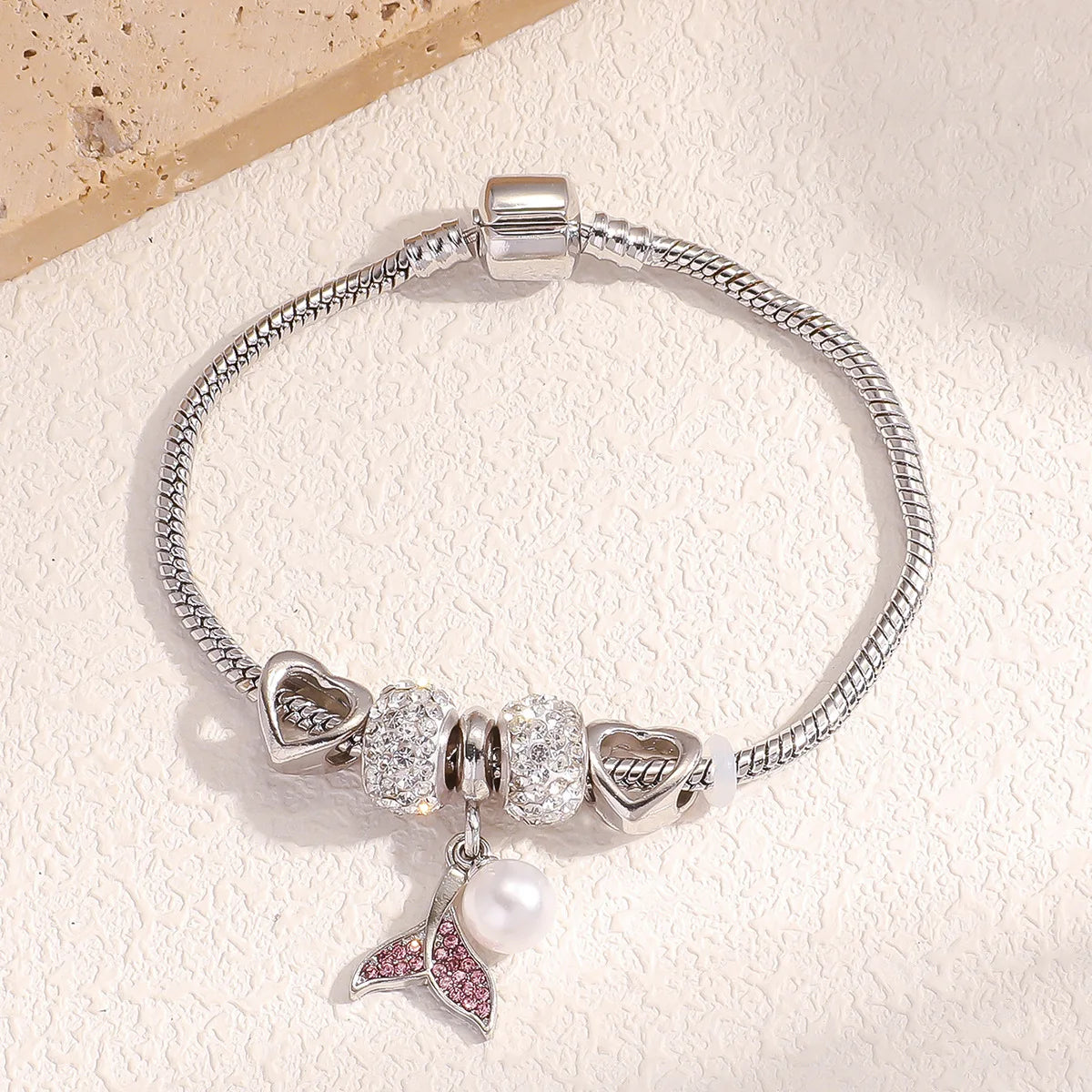 Silver beaded love bracelet set featuring heart charms and a pearl pendant