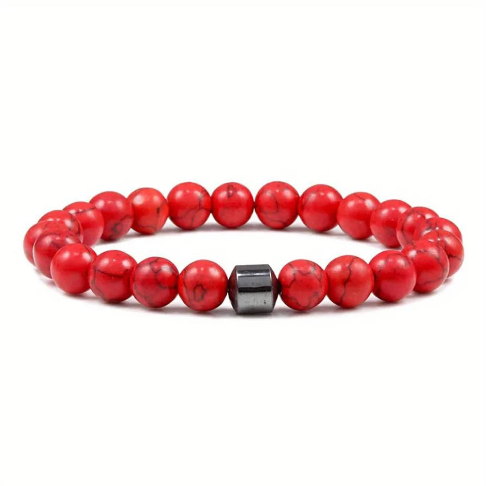 A bracelet made of polished red tiger eye lava map beads.