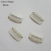 A set of three 3.2cm U-shaped blonde precision hair extension clips.