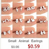 Une collection de boucles d'oreilles en argent en forme d'animaux et de cœurs présentées sur une main.