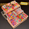 A box of colorful butterfly hair accessories and hair ties displayed in an open wooden container.