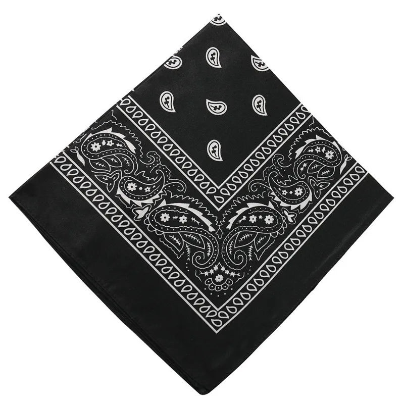 Black paisley bandana fabric with white embroidery and geometric patterns