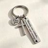Silver stainless steel couple keychain with I love you and a cross charm