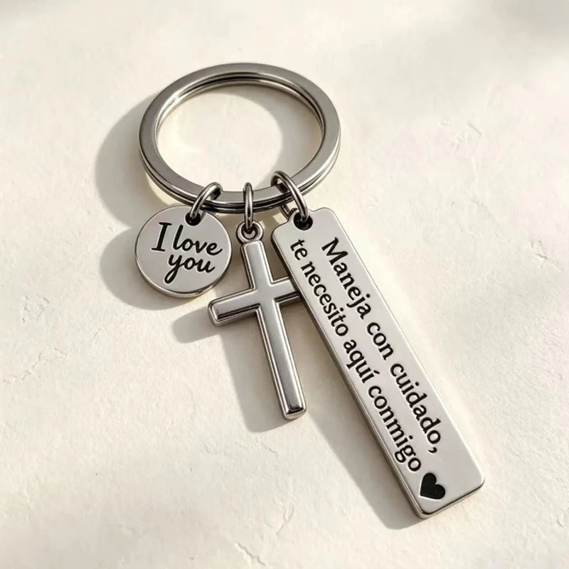 Silver stainless steel couple keychain with I love you and a cross charm