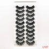 A strip of dramatic mink false eyelashes displayed on a white background.