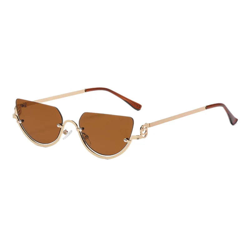 Lunettes de soleil œil de chat brun tintées avec des montures métalliques dorées fines