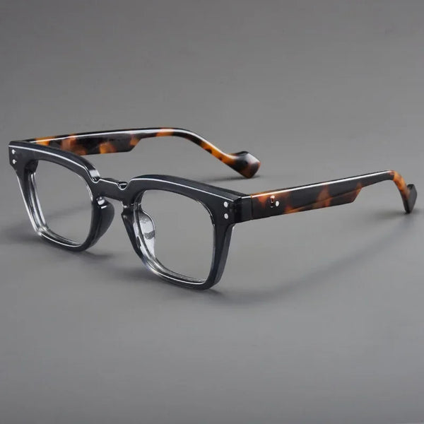A pair of tortoiseshell-patterned anti-blue light reading glasses with black frames.