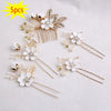 A set of five floral pearl bridal hair accessories featuring white flowers and gold accents.