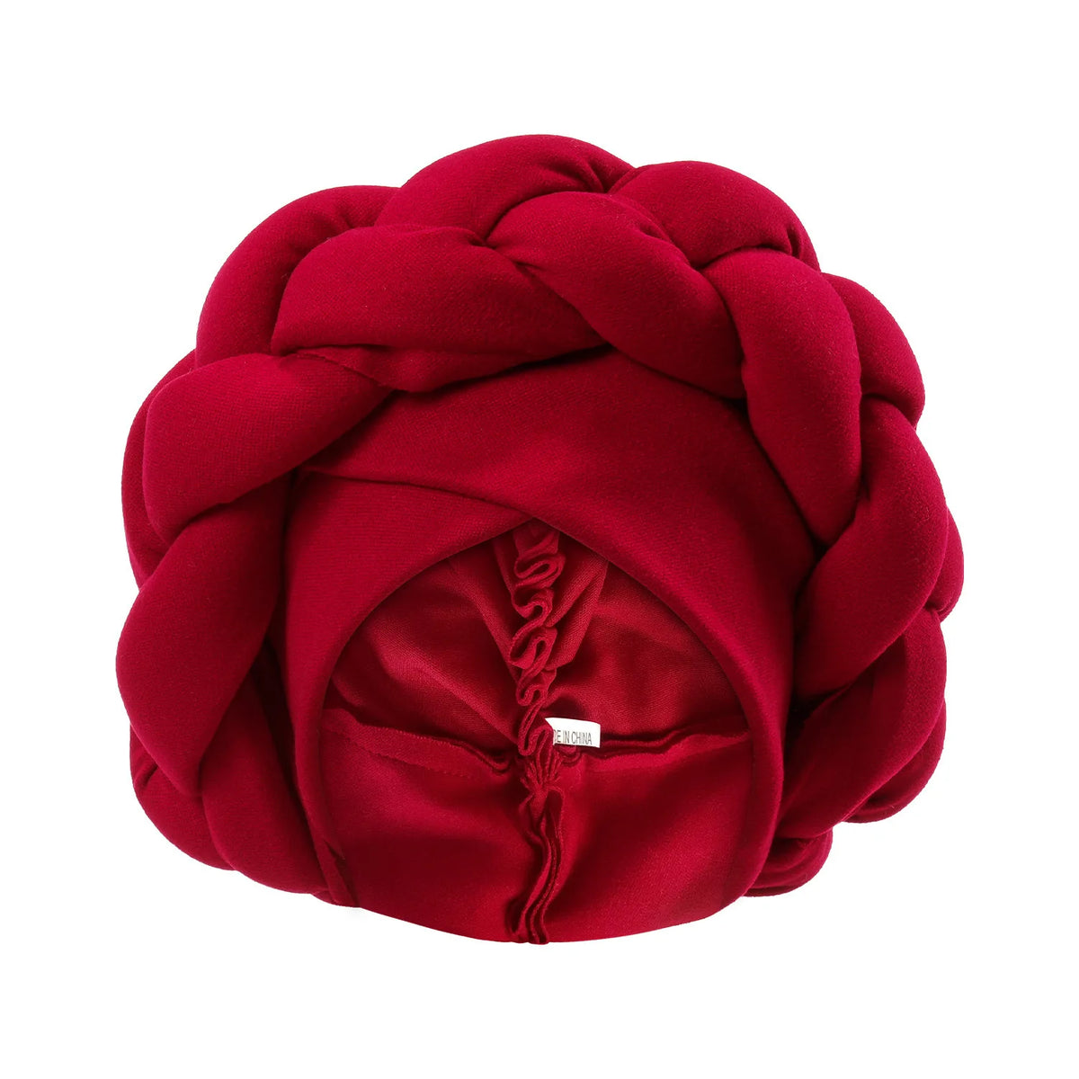 A deep red velvet braided turban cap for African party headwear.