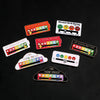 A collection of mood tracker pins and social battery pins featuring various facial expressions and indicators.