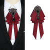 A deep red luxury rhinestone bow tie neck tie with black accents shown on a white shirt and black suit jacket.