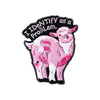 An enamel pin featuring a pink lamb with a humorous text design.