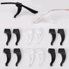 A collection of black and clear silicone anti-slip ear hooks for eyeglasses.